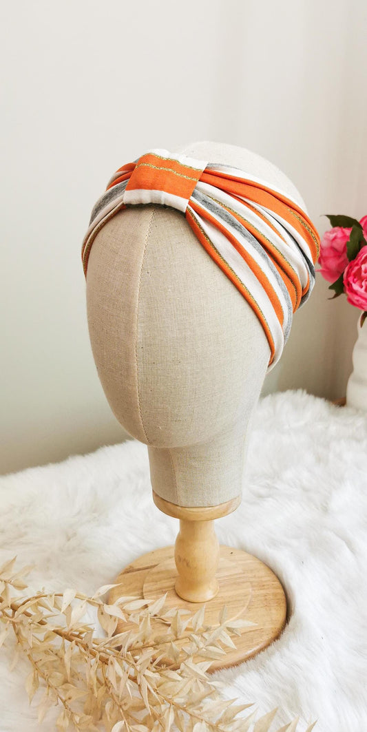 Gestreiftes, elastisches Stirnband in orange/grau/creme und gold gestreift